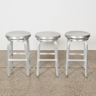 A Trio Of Industrial Swivel Top Aluminium Barstools