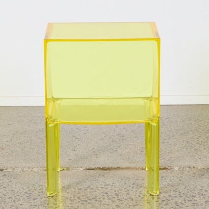 A Yellow Kartell Ghost Buster Side Table By Philippe Starck