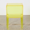 A Yellow Kartell Ghost Buster Side Table By Philippe Starck