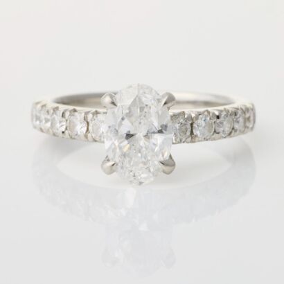 Platinum, Modernn, 1.20ct Oval Diamond / .45ct Diamond Ring