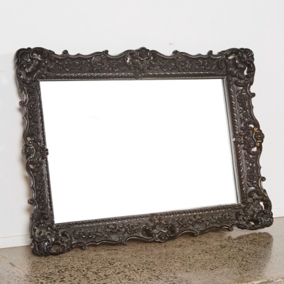 An Ornate Framed Contemporary Mirror