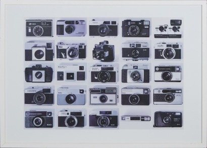 A Large Framed Print of Vintage Cameras