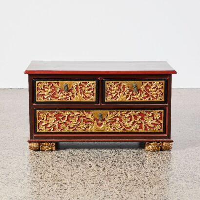 A Chinese Qing Dynasty Red Lacquer and Gilt Carved Panel Tea Table