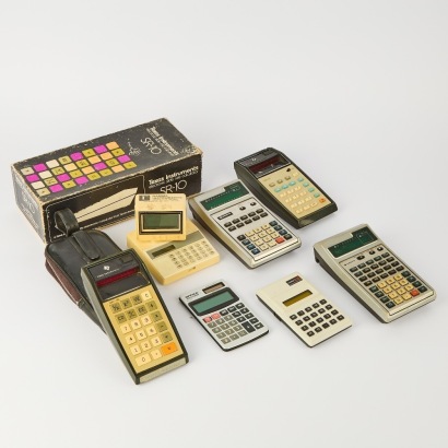 A Collection of Seven Vintage Calculators