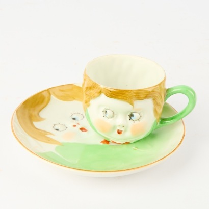 A Vintage Nippon Character Cup And Saucer