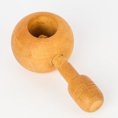 A Hand Turned Wooden Nut Cracker