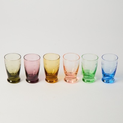 A Set of Six Coloured Liquor Glasses With Engraved Wheat Pattern