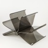 A Front Page Magazine Rack by Front for Kartell