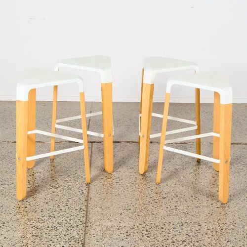 A Set of Four White Picapau Stools by Infiniti Design