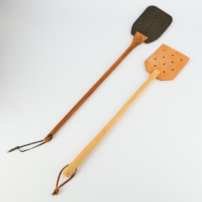 A Pair of Leather And Wood Swats