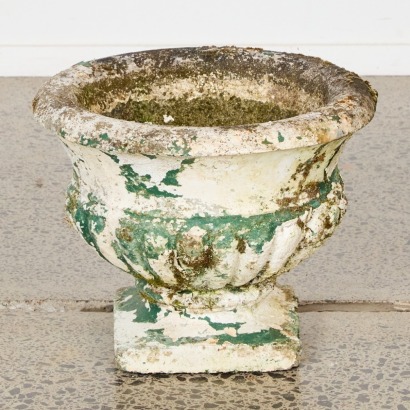 A Mossy Concrete Urn Planter