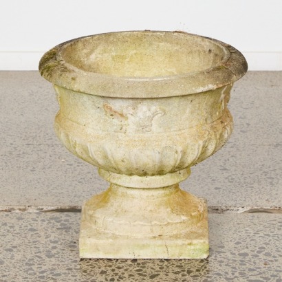 A Fleur De Lis Concrete Planter
