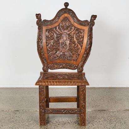 A Carved Indian Arts And Crafts Chair