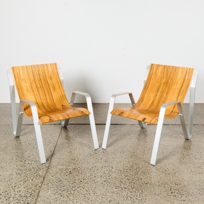 A Pair of Moulded Ply and Aluminium Armchairs