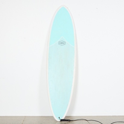 An AQSS Middie MIddle Length Surfboard 6'10"