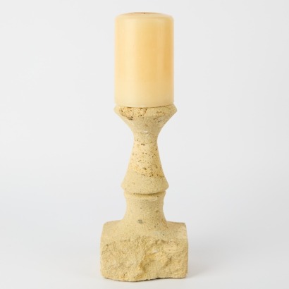 A Rustic Stone Candlestick