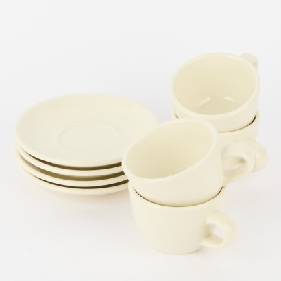 A Set of Four Acme Cups and Saucers