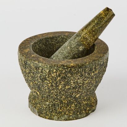 A Granite Mortar And Pestle
