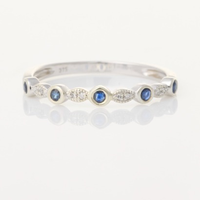 9ct White Gold, .06ct Diamond / 1.3mm Round Sapphire Ring - Near new