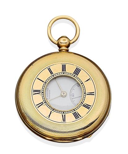 A Gentleman's gold half hunter pocket watch by Rockbank & Atkins, London, circa 1868. Key wind. 50mm. Movement numbered 11136. Blue enamel chapter ring. White enamel dial and printed black Roman numerals, subsidiary seconds. Dial and movement signed. 18ct