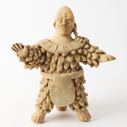 A Mexican Handmade Clay Figure