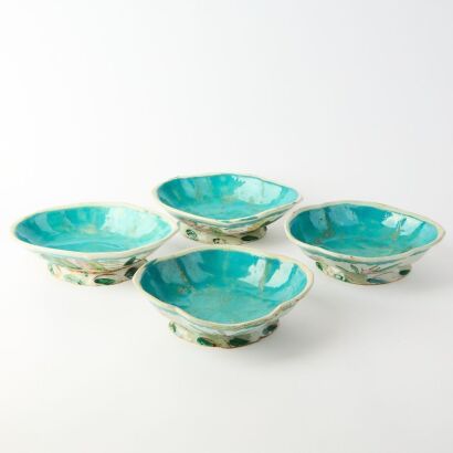 A Group of Four Chinese Late Qing Dynasty Famille-rose 'Floral' Lobed Dishes (Various Sizes)