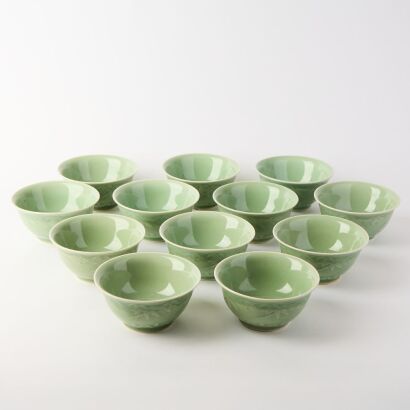 A Set of Twelve Chinese Celadon-glazed 'Bamboo' Bowls
