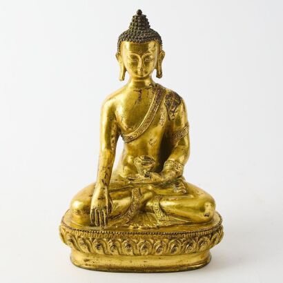 A Chinese Late Qing Dynasty Gilt-bronze Buddha