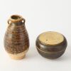 A Set of Two South Asian Brown-glazed Jars