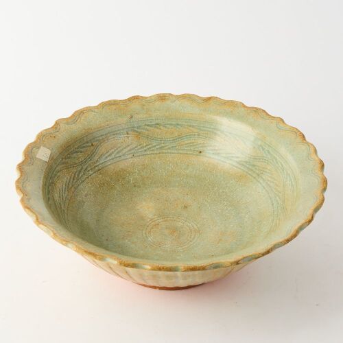 A Chinese Ming Dynasty Celadon-glazed Carved Bowl