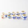 A Collection of Chinese Blue and White Bird Feeders