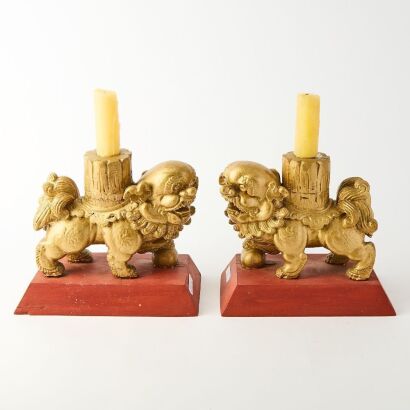A Pair of Chinese Gilt-lacquered Wooden Lion Figures