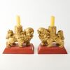 A Pair of Chinese Gilt-lacquered Wooden Lion Figures