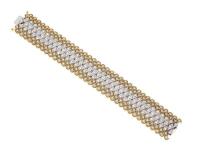 A gold and diamond bracelet, the flexible two tone bracelet set throughout with round brilliant cut diamonds of estimated total weight 10 carats. 18ct yellow and white gold. Weight 47.80 grams. Length 18cm. Width 25mm.