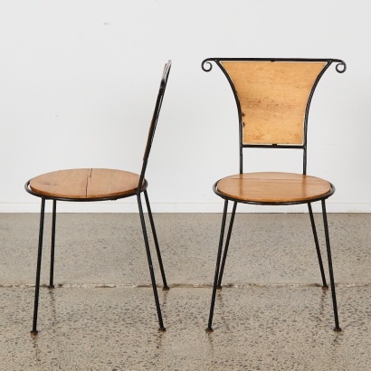 A Pair of Post Modern Wrought Iron and Wooden Chairs