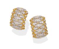 A pair of gold and diamond earrings, the pierced half-hoops of two tone design and set throughout with round brilliant diamonds. 18ct yellow and white gold. Weight 20.2 grams. Length 25mm. Width 18mm. Post and clip attachments. 