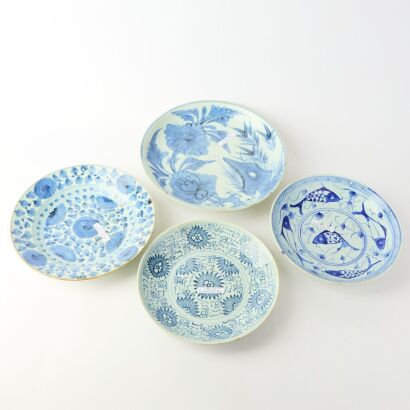 A Group of Four Chinese Ming to Qing Dynasty Blue and White Dishes