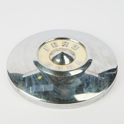 A Vintage Ford Chrome Hubcap