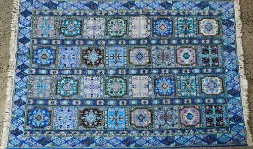 A Moroccan Hand-Knotted Wool Rug