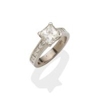 2.20ct Princess cut H SI2 AGL Important Diamond solitaire diamond ring, claw set with a central princess cut diamond of known weight, the shoulders channel set with princess cut diamond of total known weight 0.83 carat. Platinum. Weight 9.98 grams. Size N