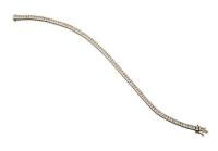 A diamond bracelet, the articulated bracelet channel set with eighty-seven princess cut diamonds of known weight 4.05 carats. 18ct white gold. Weight 11.7 grams. Length 18cm. Gemmologist's report available.