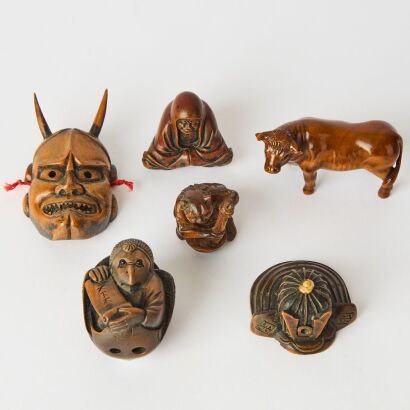 A Group of Six Japanese Meiji Period Carved Wood Netsuke
