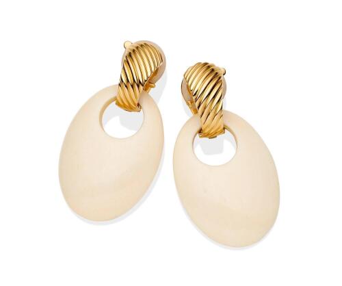 A pair of gold earrings, Van Cleef & Arpels, circa 1950's. Of tapered bombe design. 18ct yellow gold. Length 28mm. Signed "VCA". Maker's mark and French assay marks. Clip attachments. Original pouch. To be sold with additional drop attachments.  