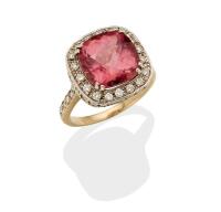 A pink tourmaline and diamond ring, the square fancy cut tourmaline of estimated weight 4.9 carats, claw set above a diamond frame. Estimated total diamond weight 1.02 carats. Weight 6.8 grams. Size N. Gemmologist's report available.