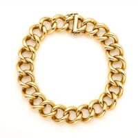 A gold bracelet, of plain polished, curblink design. 14ct yellow gold. Weight 51.15 grams. Length 17cm.