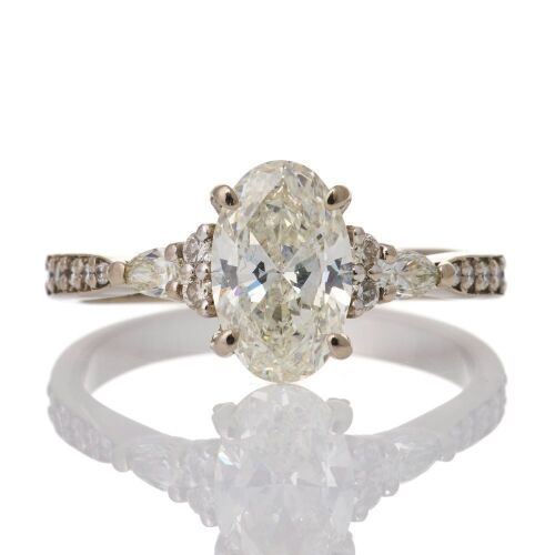 18ct White Gold, 1.70ct Oval Brilliant Cut / .40ct Diamond Ring