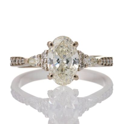 18ct White Gold, 1.70ct Oval Brilliant Cut / .40ct Diamond Ring