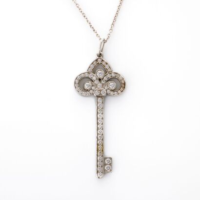 Tiffany & Co, Platinum, Fleur de Lis .41ct Diamond Key on 45cm Cable Link Chain, circa 2015
