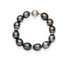 A Tahitian pearl bracelet, the twelve semi-baroque pearls measuring 14mm, spaced by three diamond rondels and hung with a brushed ball clasp. 18ct white gold. Weight 56.20 grams. Length 23cm.&nbsp;