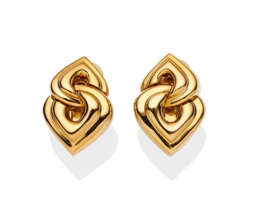 A pair of gold earrings, Bulgari, circa 1980's. Of plain polished, interlocking heart design. 18ct yellow gold. Weight 15.70 grams. Length 2.3mm. Signed Bulgari. Clip attachments.&nbsp;